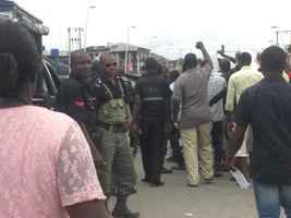 Armed Nigerian Police, disrupting the peaceful demonstration on WHD 